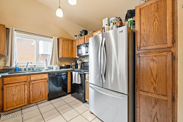 kitchen with vaulted ceiling, sink, hanging light fixtures, light tile patterned floors, and black appliances