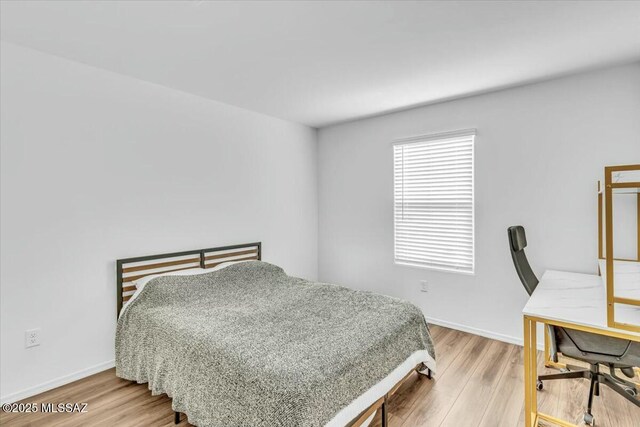 unfurnished room featuring visible vents and light wood-style floors