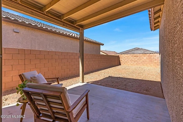 view of patio with a fenced backyard