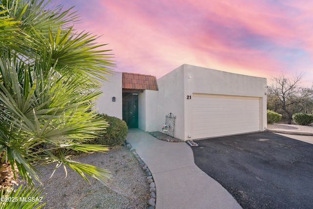 view of front of property featuring a garage