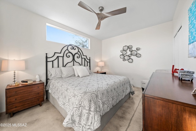 bedroom with light colored carpet and ceiling fan