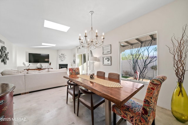 dining room with a notable chandelier