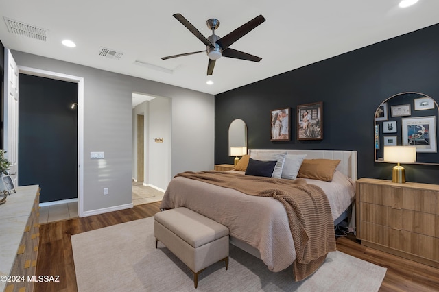 bedroom featuring dark wood-type flooring and ceiling fan