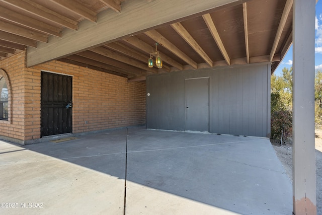 view of patio featuring a carport