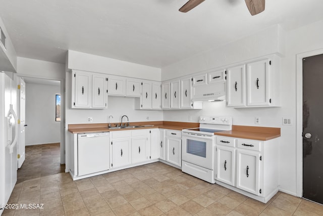 kitchen with white cabinetry, sink, white appliances, and extractor fan