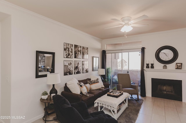 living room featuring crown molding and ceiling fan