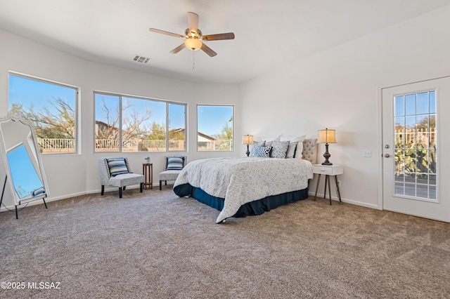 carpeted bedroom with ceiling fan and access to exterior