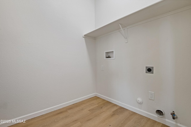 laundry area with wood-type flooring, hookup for a gas dryer, hookup for a washing machine, and electric dryer hookup