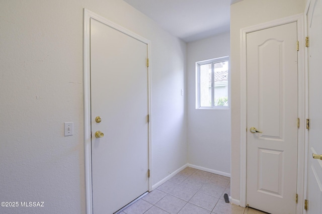 2283 E Buster Mountain Dr, Oro Valley, AZ 85755 - entryway with light tile patterned flooring and baseboards