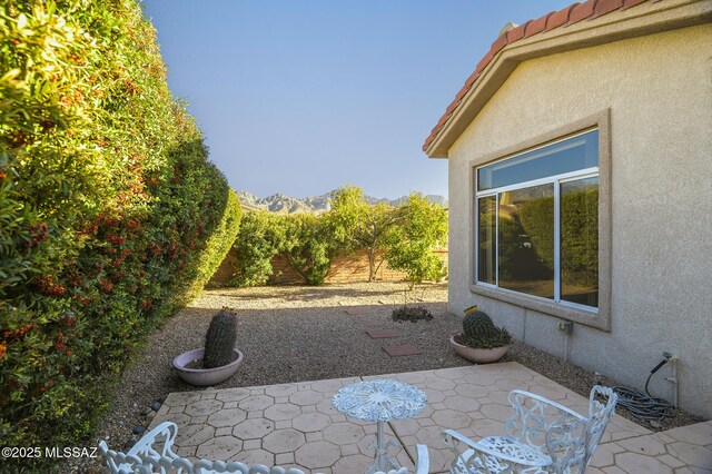 2283 E Buster Mountain Dr, Oro Valley, AZ 85755 - fenced backyard featuring a patio and a mountain view