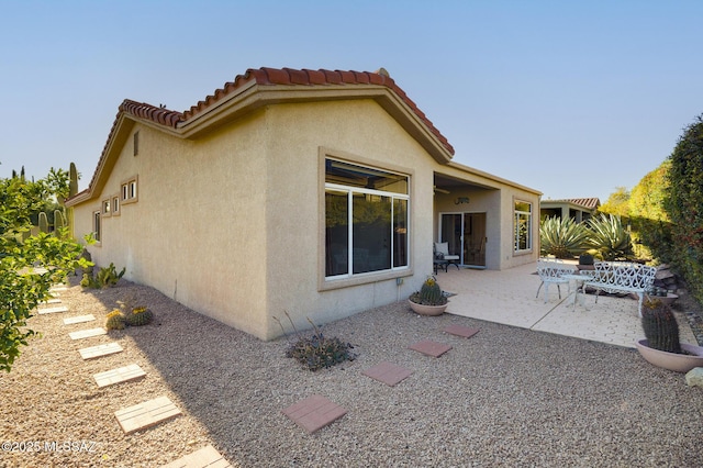 2283 E Buster Mountain Dr, Oro Valley, AZ 85755 - back of house featuring stucco siding, a patio area, and a tile roof