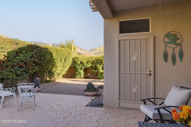 view of patio with a mountain view