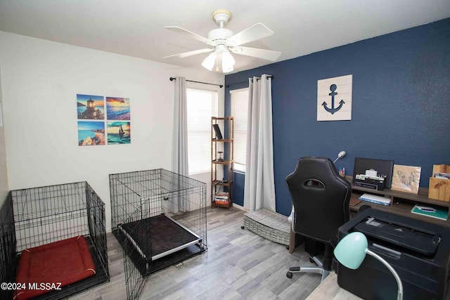 office with ceiling fan and wood finished floors