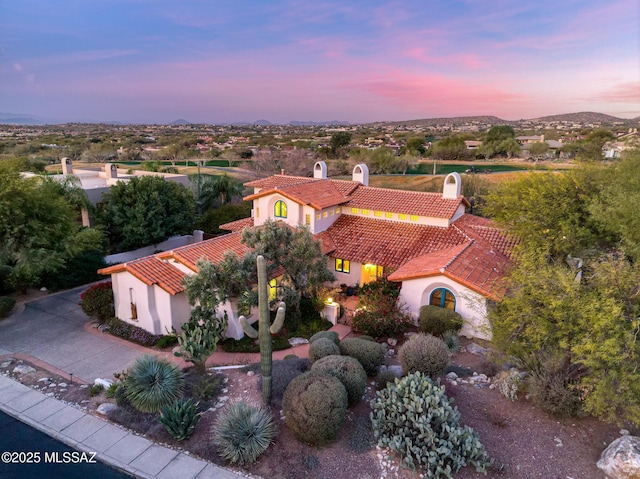 view of aerial view at dusk