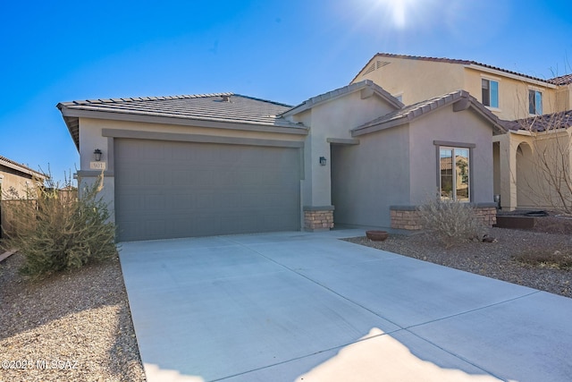 view of front of home with a garage