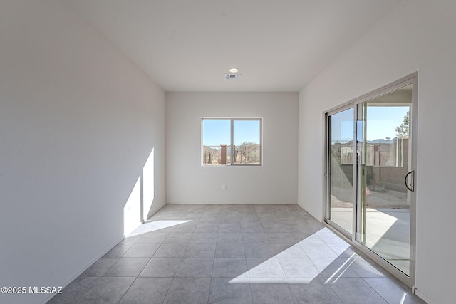 view of tiled spare room