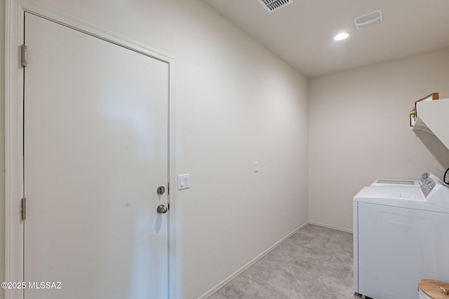 laundry room with washer and dryer