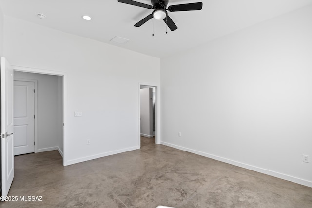 unfurnished bedroom featuring ceiling fan and concrete flooring