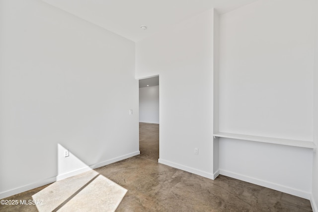 empty room featuring concrete floors