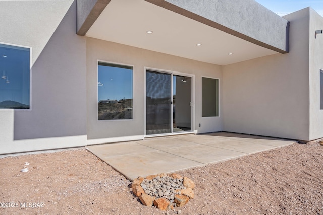 back of house with a patio area