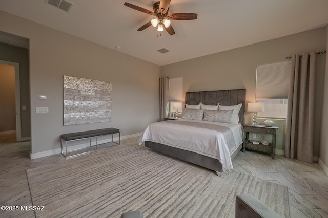 bedroom featuring visible vents, baseboards, and ceiling fan