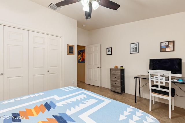 bedroom featuring ceiling fan and a closet