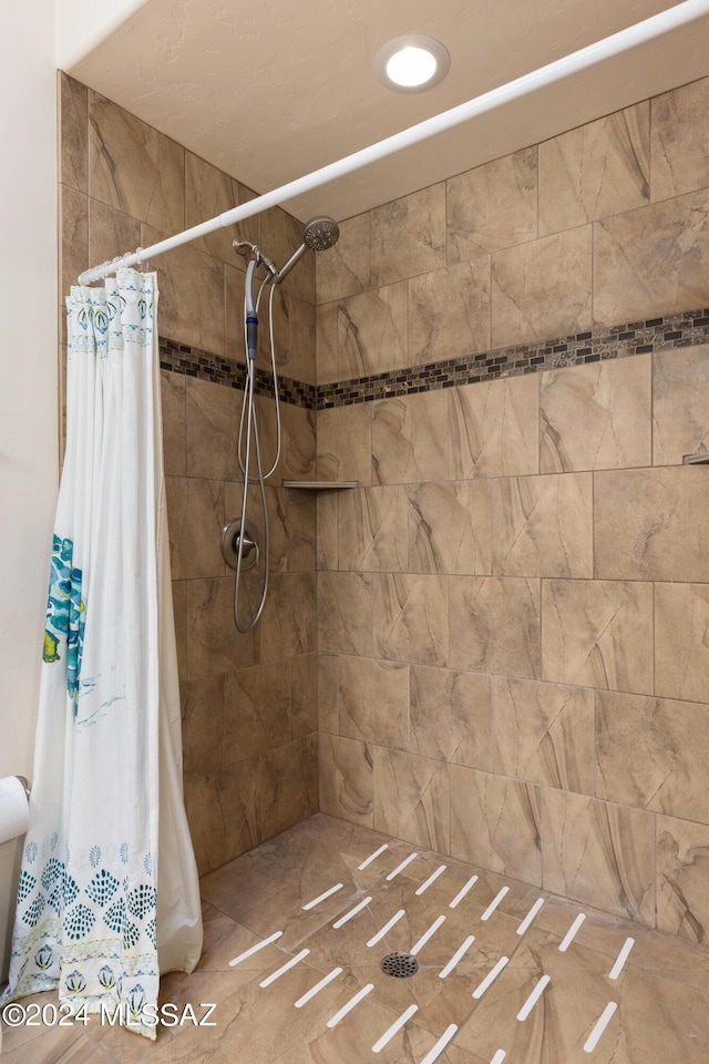 bathroom featuring walk in shower