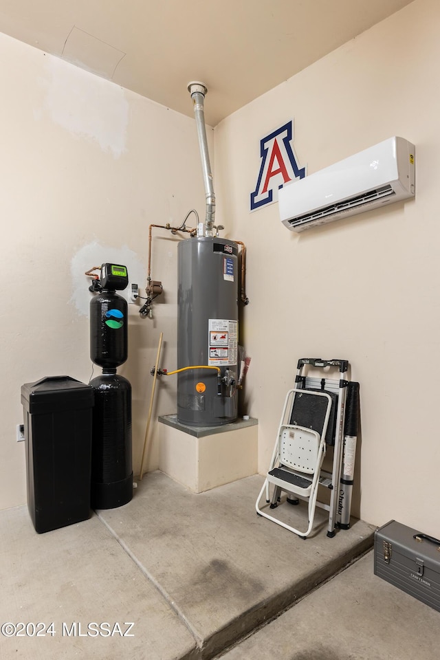 utility room with a wall mounted AC and water heater