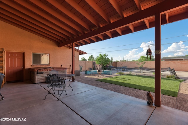 view of patio with a covered hot tub