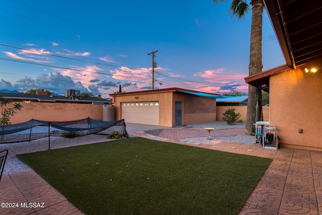 exterior space with an outbuilding and a garage