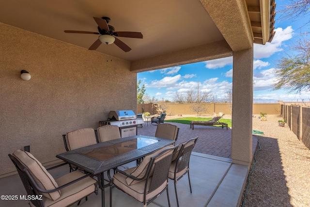 view of patio with ceiling fan