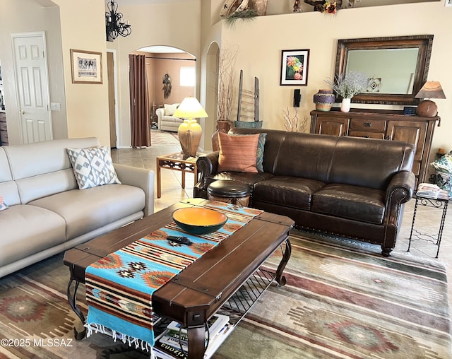 living room with tile patterned floors