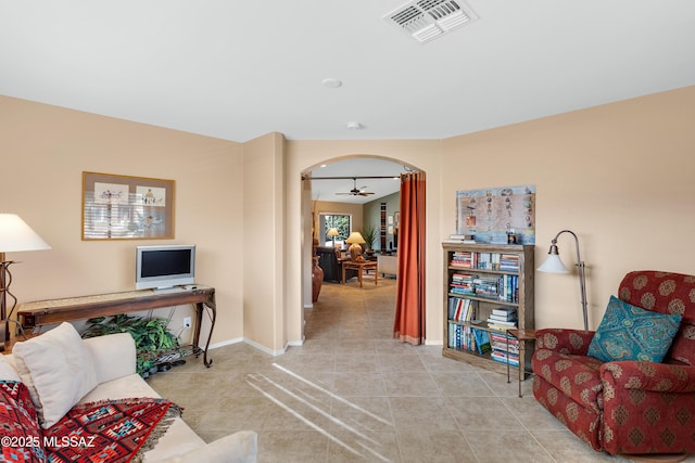 interior space featuring ceiling fan