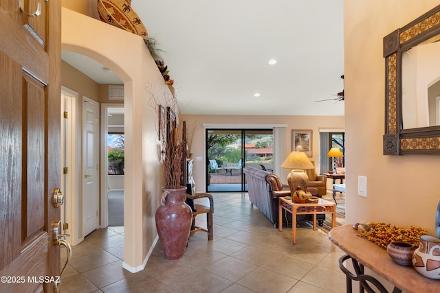 hallway with light tile patterned floors