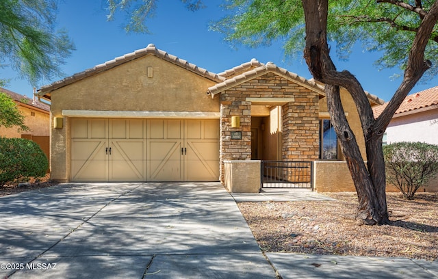 view of front of home with a garage