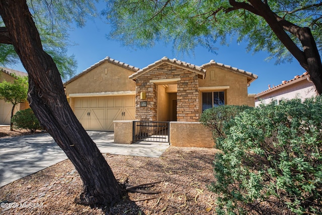 view of front of property featuring a garage