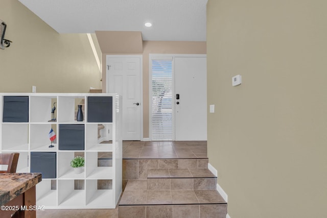 view of tiled entrance foyer