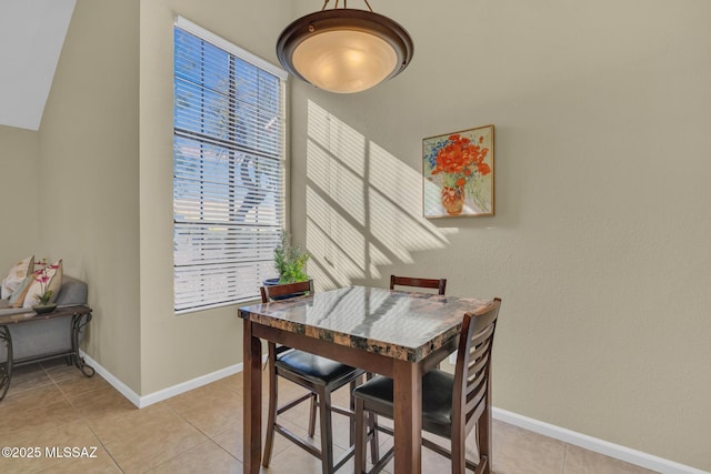 dining room with light tile patterned floors