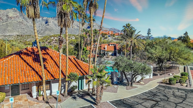 exterior space featuring a mountain view