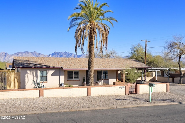 single story home with a mountain view