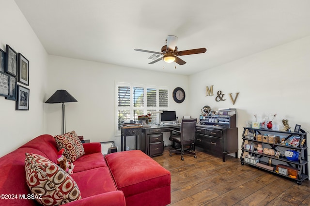 office with dark wood finished floors and ceiling fan