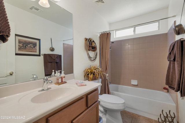 bathroom with shower / tub combo, visible vents, vanity, and toilet