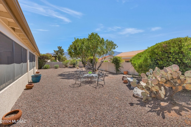 view of yard with a patio area and a fenced backyard