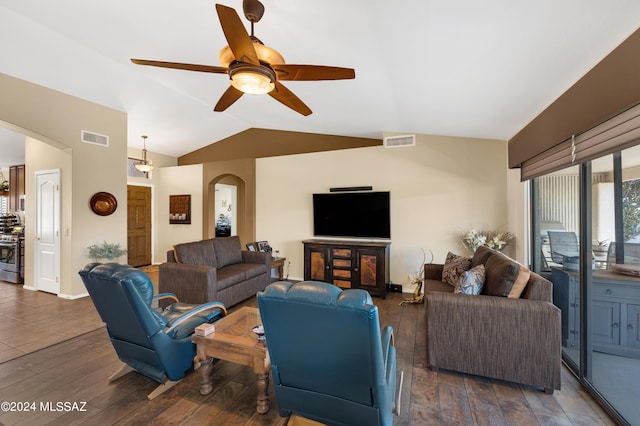 living room featuring arched walkways, dark wood-style flooring, visible vents, and vaulted ceiling