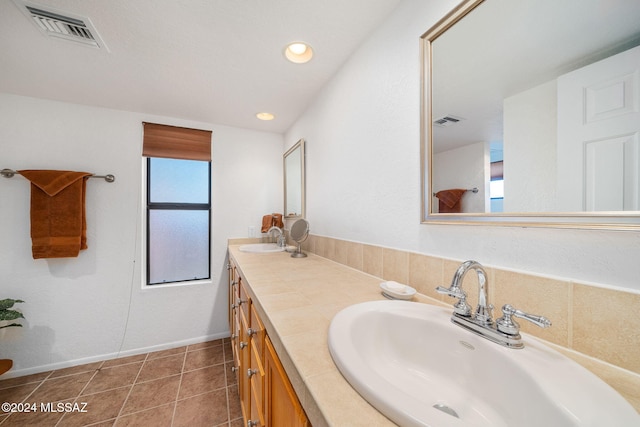 bathroom with vanity and tile patterned floors