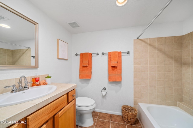 full bathroom with vanity, toilet, shower / bath combination, and tile patterned flooring