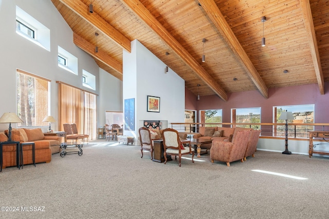 carpeted living room featuring wood ceiling, beam ceiling, and a wealth of natural light