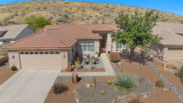 view of front of house with a garage