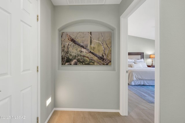 hallway featuring light hardwood / wood-style flooring