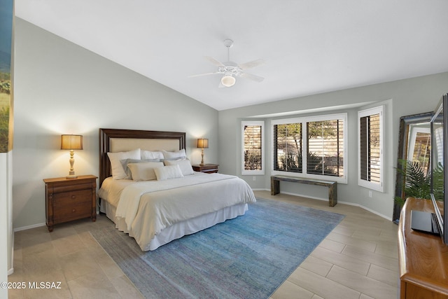 bedroom featuring vaulted ceiling and ceiling fan